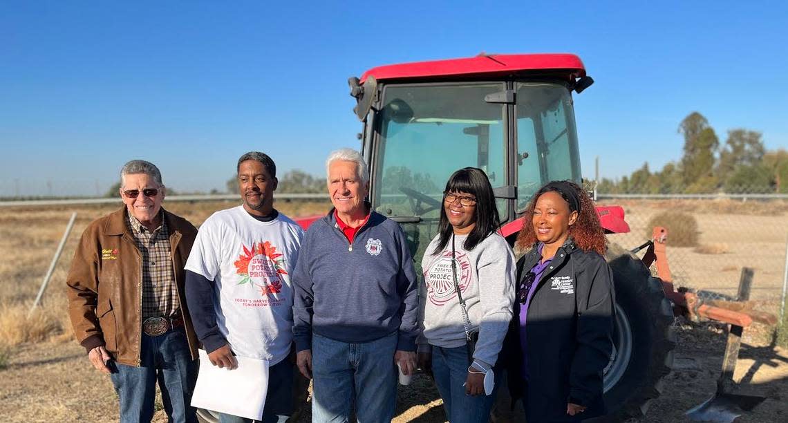 (L to R) Earl Hall, owner of Hall Management Corp; Patrick Hamilton, manager of the Sweet Potato Project; Congressman Jim Costa; Yolanda Randles, executive director of the West Fresno Family Resource Center, and Janice Mathurin, director of operations for WFFRC during the harvest on Saturday, Oct. 29, 2022.