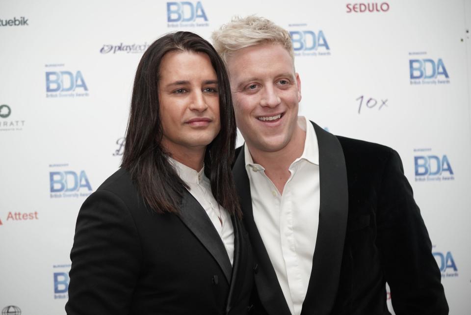 Ollie Locke (Left) with his husband Gareth Locke arrives at the Burberry British Diversity Awards at the De Vere Grand Connaught Rooms in London. Picture date: Thursday March 10, 2022.