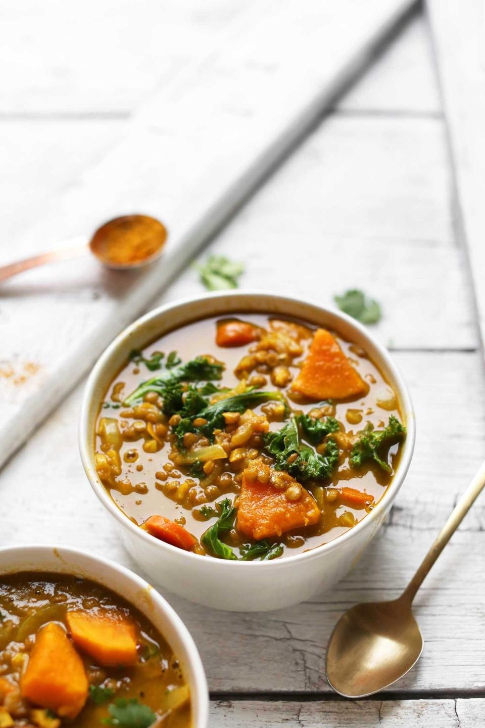 two bowls of soup on a table