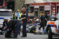 <p>First responders treat injured passengers after a New Jersey Transit train crashed into the platform at Hoboken Terminal during morning rush hour September 29, 2016 in Hoboken, New Jersey. (Eduardo Munoz Alvarez/Getty Images) </p>