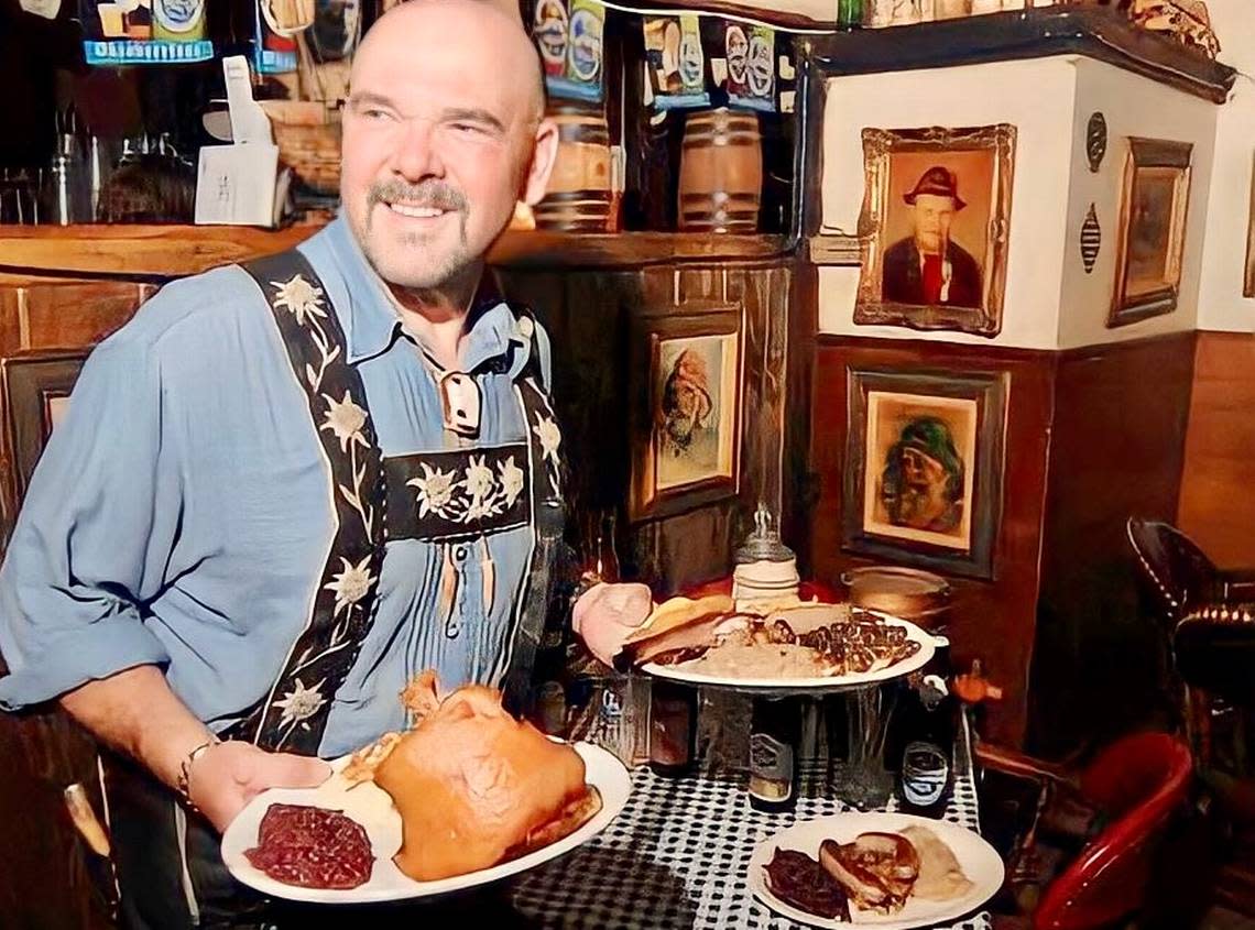 Bernd Schnerzinger holds plates of food at Edelweiss in 2007. 