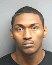 <p>The basketball player formerly known as Ron Artest was arrested and charged with domestic battery in 2006. (Photo credit: Law Enforcement) </p>