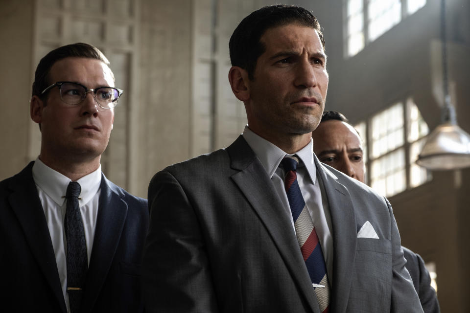 This image released by 20th Century fox shows Jon Bernthal, right, in a scene from "Ford v. Ferrari," in theaters on Nov. 15. (Merrick Morton/20th Century Fox via AP)