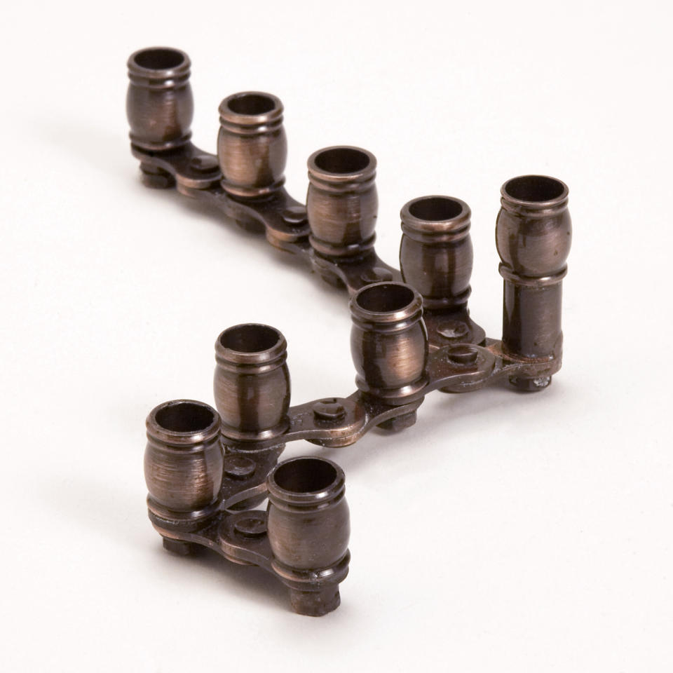 This product image released by Moderntribe.com shows a menorah made from a bicycle chain, a perfect gift for the Jewish hipster this holiday season. (AP Photo/Moderntribe.com)