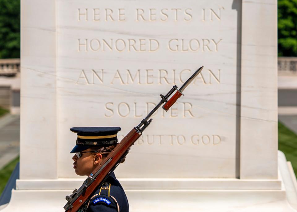 Sargent Torres, walks past the Tomb of the Unknown Solider during the changing of the guard in Arlington National Cemetery on Thursday, May 27, 2021.