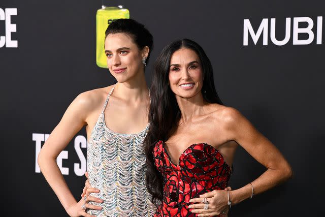 <p>Jon Kopaloff/Getty</p> Margaret Qualley and Demi Moore