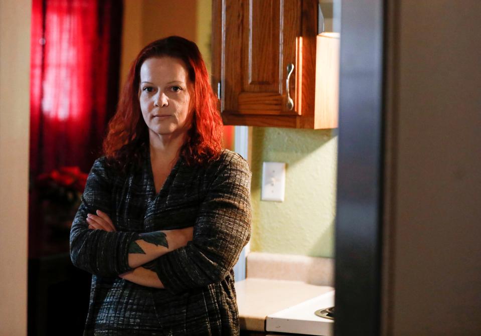 Mylissa Farmer stands for a portrait at her home in Joplin, Mo., on Sept. 28, 2022. In early August, Farmer had to travel to Illinois to terminate her pregnancy when her water broke at 17 weeks and 5 days and put her life in danger. (Nathan Papes/The Springfield News-Leader via AP, File)