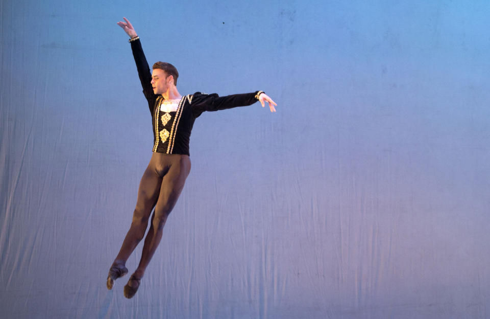 In this Oct. 29, 2018 photo, Cuban expatriate ballet dancer Taras Domitro performs in Havana, Cuba. Dancers had written a letter requesting permission to return and, unlike in previous years, ballet director Alicia Alonso, now 96, and the then-Minister of Culture expressed no objection to the their return, according to a Cuban official with knowledge of the process who spoke on condition of anonymity because he was not authorized to discuss the process.(AP Photo/Desmond Boylan)