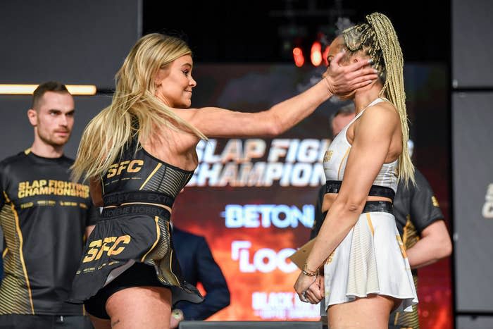 Adrianna “Flychanelle” Śledź slaps Julia Kruzer during the Slap Fighting Championships on March 5, 2022, in Columbus, Ohio. 