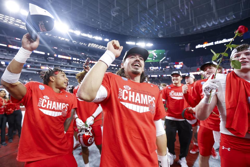 Utah Utes celebrate after beating the USC Trojans in the Pac-12 Championship at the Allegiant Stadium in Las Vegas on Friday, Dec. 2, 2022. The Utes won 47-24.