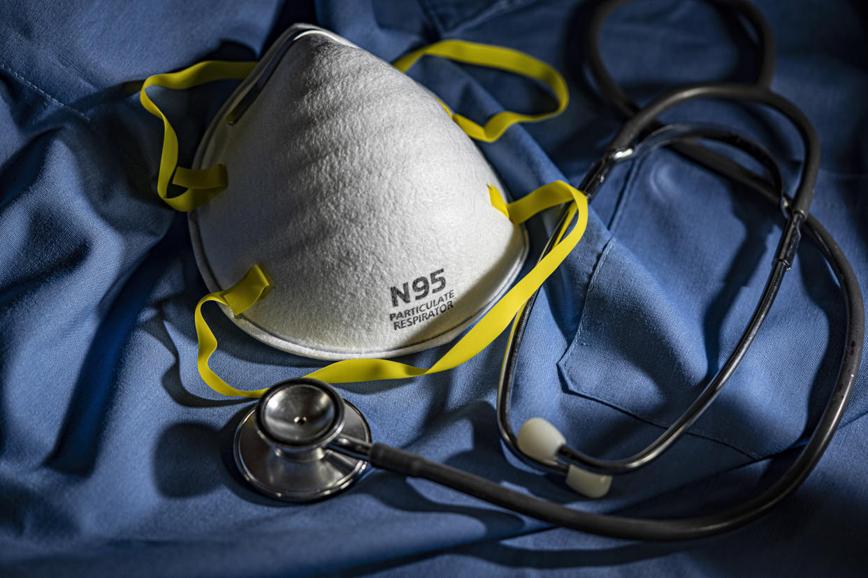 People who work in hospitals and could face exposure to sub-micron particles should wear N95 respirators, so named for their 95 percent filtration capacity. (Getty Images)