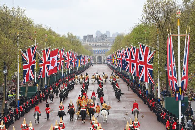 Dan Mullan/Getty A procession on King Charles' May 6 coronation day.