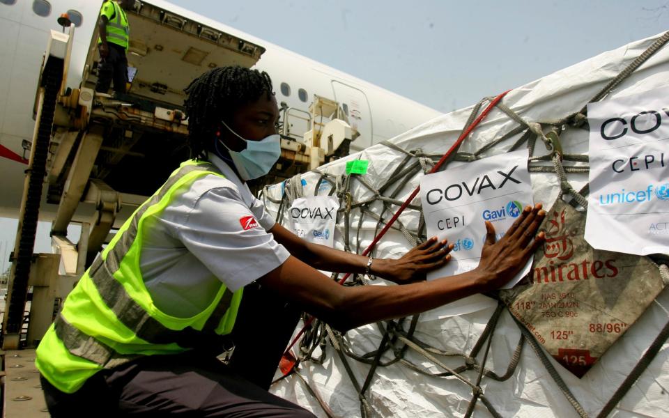 A shipment of vaccines landing in the Ivory Coast - Diomande Ble Blonde/AP