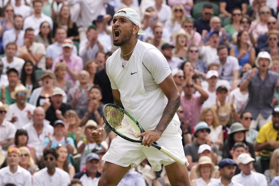 Australia's Nick Kyrgios reacts after winning a point against Brandon Nakashima of the US in a men's singles fourth round match on day eight of the Wimbledon tennis championships in London, Monday, July 4, 2022. (AP Photo/Alberto Pezzali)