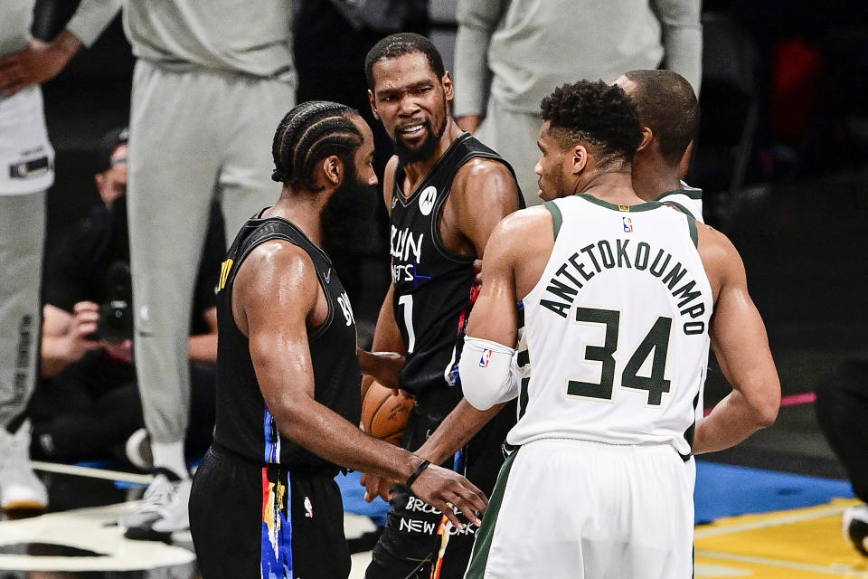 James Harden, Kevin Durant and the Brooklyn Nets will face Giannis Antetokounmpo's reigning champion Milwaukee Bucks on opening night. (Steven Ryan/Getty Images)