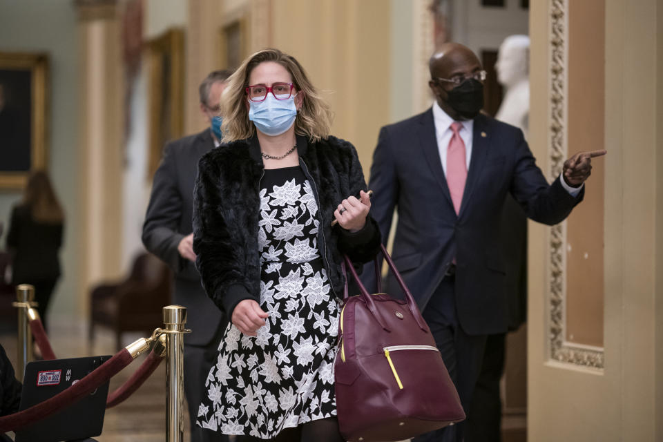 Democratic Sens. Kyrsten Sinema (Ariz.) and Raphael Warnock (Ga.) arrive at the second impeachment trial of former President Donald Trump. (Photo: J. Scott Applewhite/AP)