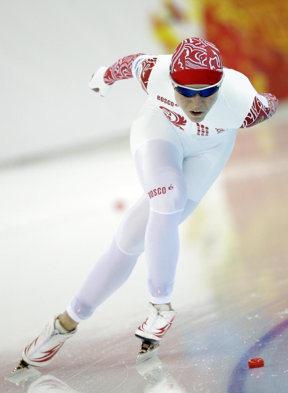 Russia's Olga Graf competes in the women's 3,000-meter speedskating race at the Adler Arena Skating Center during the 2014 Winter Olympics, Sunday, Feb. 9, 2014, in Sochi, Russia. (AP Photo/Patrick Semansky)