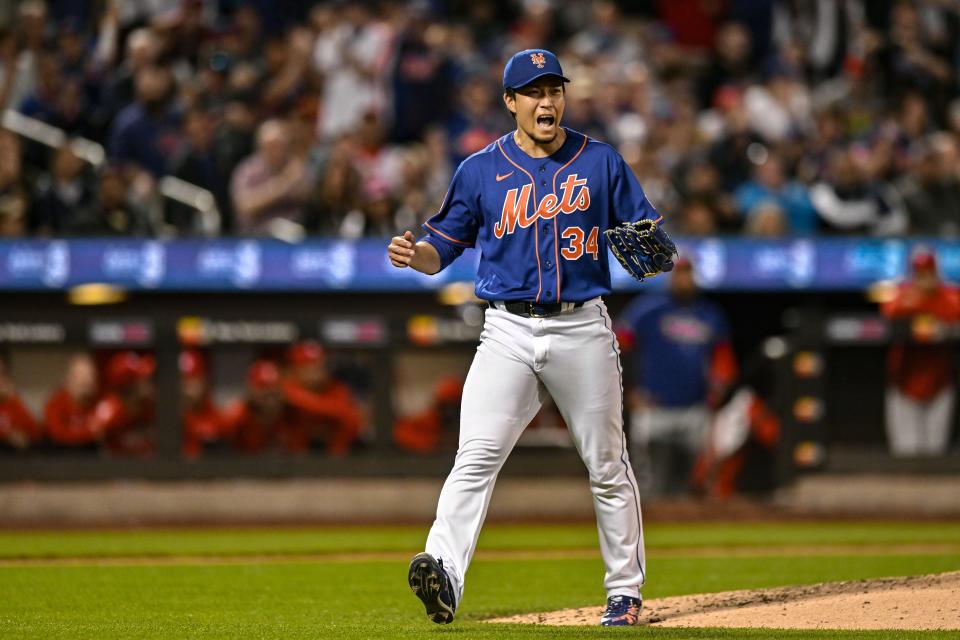 New York Mets starting pitcher Kodai Senga (34) reacts after striking out Philadelphia Phillies designated hitter Kyle Schwarber (not pictured) during the seventh inning on May 30, 2023 at Citi Field.