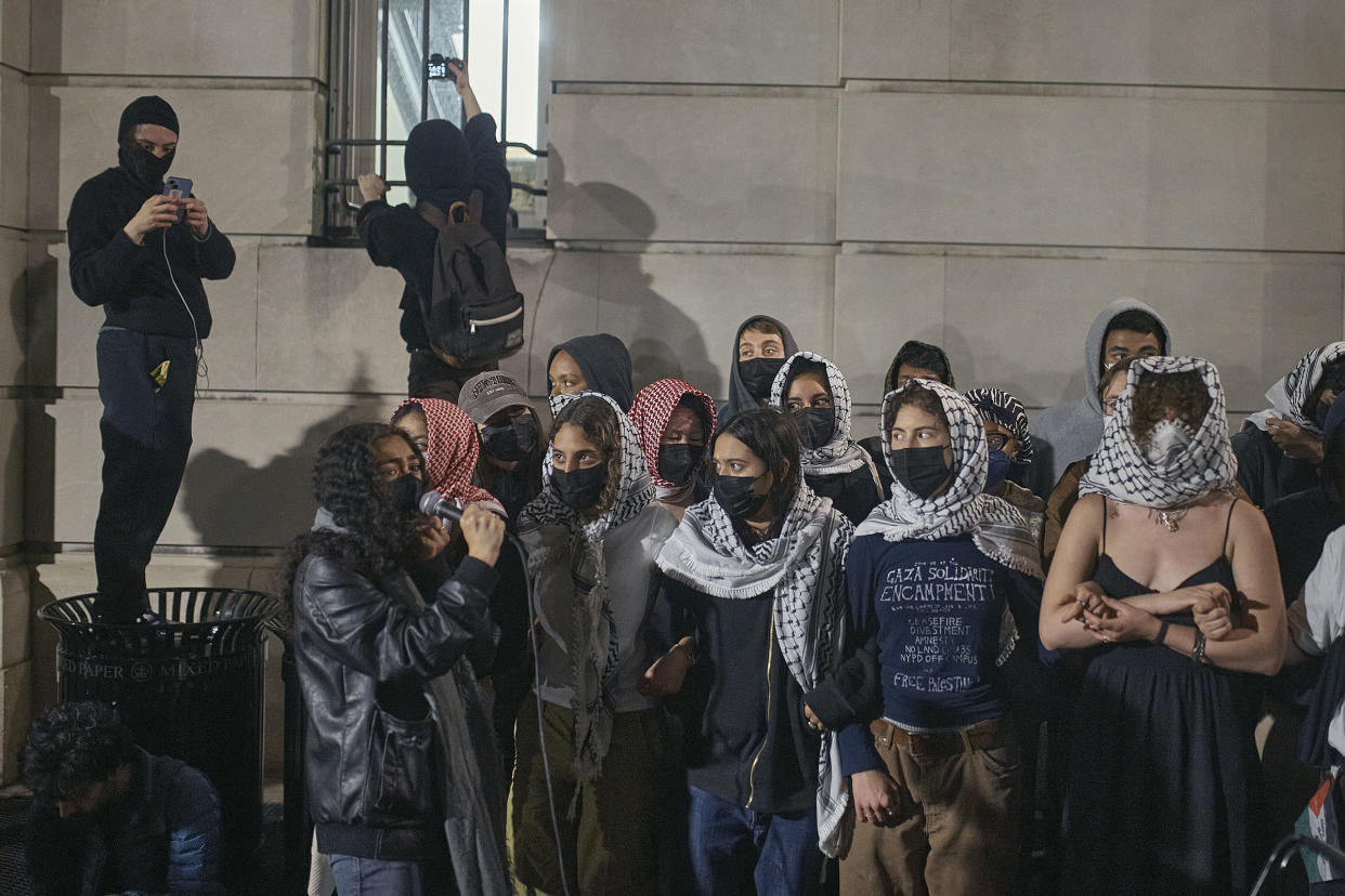 Protestors block Hamilton Hall as they take over the interior of the building on Columbia University campus during a pro-Palestinian encampment, on April 29, 2024.<span class="copyright">Andres Kudacki for TIME</span>