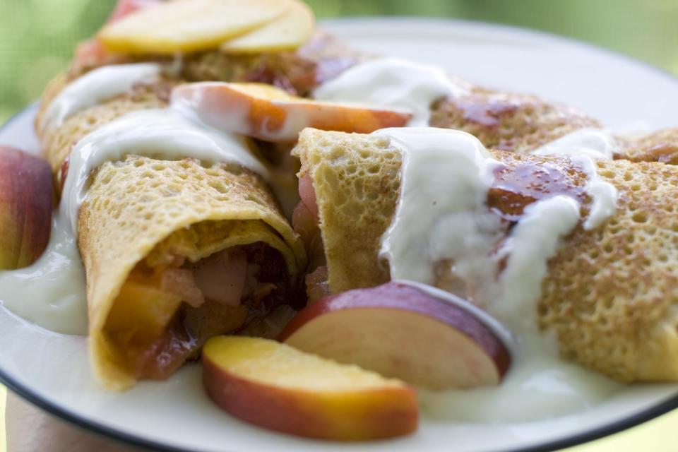 This July 8, 2013 photo shows corn crepes stuffed with summer fruits in Concord, N.H. One of the earliest French culinary imports to make a dent in America was the crepe. (AP Photo/Matthew Mead)