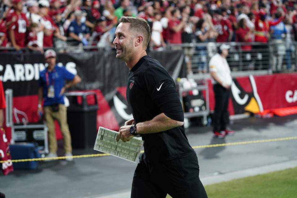 Arizona Cardinals head coach Kliff Kingsbury leaves the field after an NFL football game against the Houston Texans, Sunday, Oct. 24, 2021, in Glendale, Ariz. The Cardinals won 31-5. (AP Photo/Ross D. Franklin)