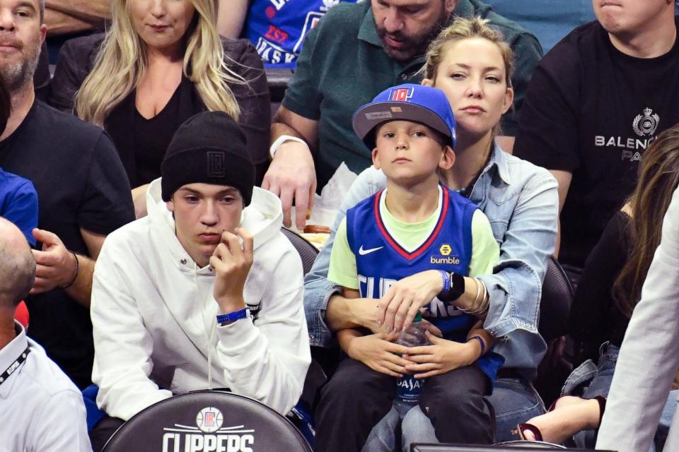 PHOTO: (L-R) Ryder Robinson, Bingham Hawn Bellamy and Kate Hudson attend a basketball game between the Los Angeles Clippers and the Los Angeles Lakers at Staples Center on Oct. 22, 2019 in Los Angeles. (Allen Berezovsky/Getty Images, FILE)