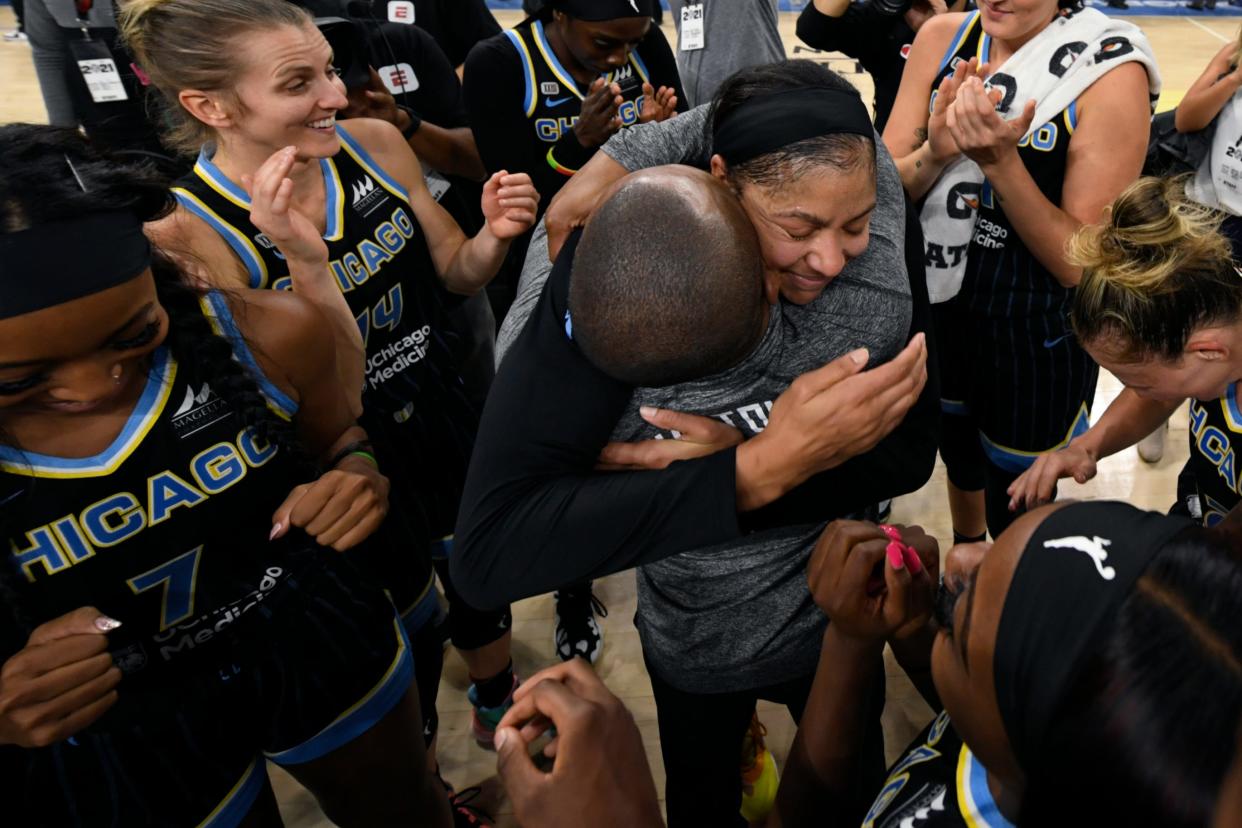 Candice Parker and coach James Wade celebrate after the Chicago Sky advanced to the WNBA Finals.