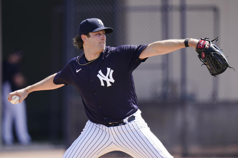 New York Yankees' Gerrit Cole delivers a pitch during a spring training baseball workout Monday, Feb. 22, 2021, in Tampa, Fla. (AP Photo/Frank Franklin II)