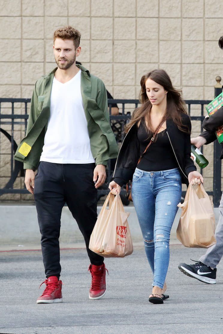 Nick Viall with Vanessa Grimaldi carrying grocery bags