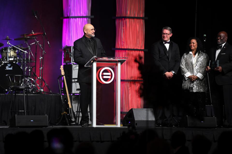 Joe Armstrong, owner and CEO of radio station WJBE, accepts the Minority Business of the Year award at the Knoxville Area Urban League’s Equal Opportunity Awards Gala in October 2022 at the Knoxville Convention Center.