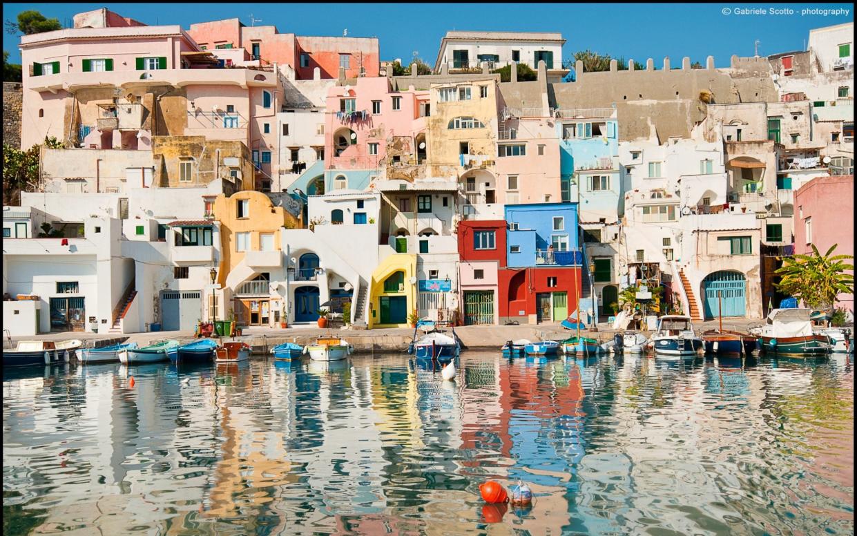 The island of Procida lies in the Bay of Naples, along with Capri and Ischia - Gabriele Scotto di Fasano/Moment RF