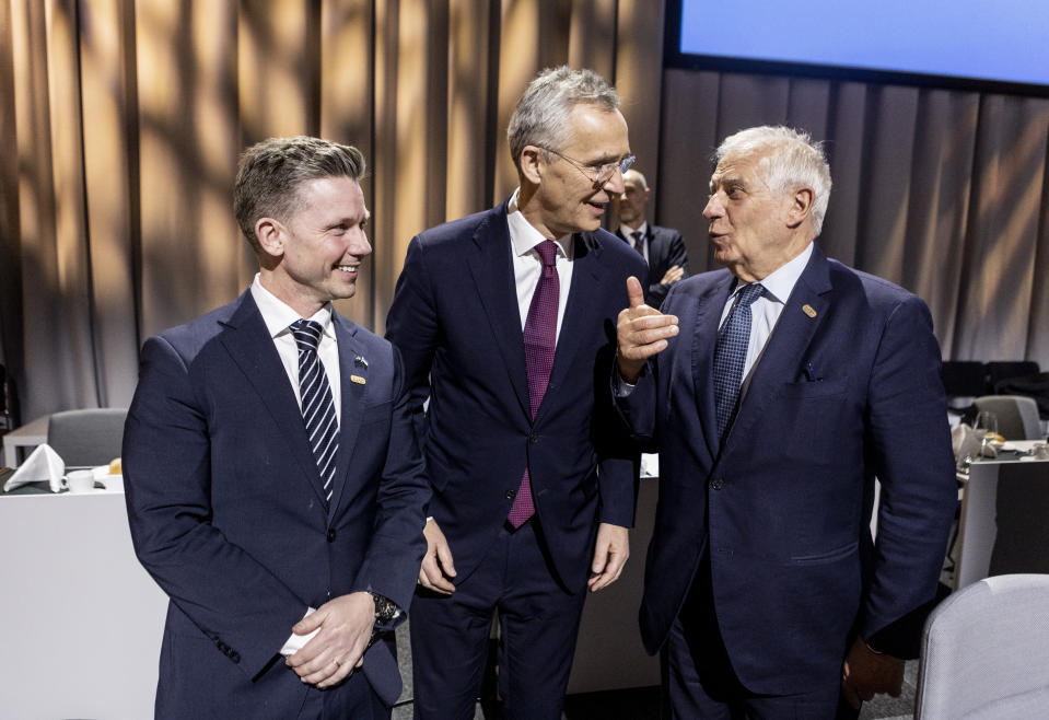 From left, Sweden's Defence Minister Pal Jonsson, NATO Secretary General Jens Stoltenberg, left, and European Union foreign policy chief Josep Borrell attend the informal meeting of EU defence ministers at the Scandinavian XPO in Marsta outside Stockholm, Sweden Wednesday, March 8, 2023. (Christine Olsson/TT News Agency via AP)