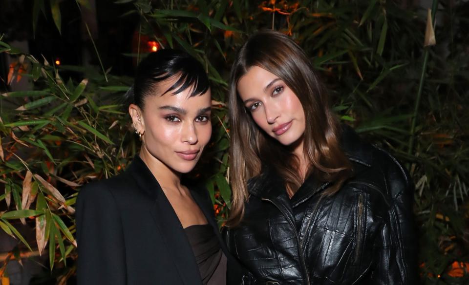 Zoë Kravitz and Hailey Bieber at the CAA pre-Oscar party at San Vicente Bungalows. - Credit: Getty Images for CAA
