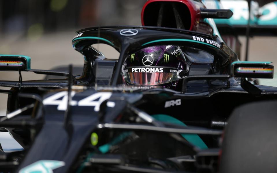 Lewis Hamilton of Great Britain and Mercedes GP in the pit stop during practice for the F1 Grand Prix of Austria - GETTY IMAGES