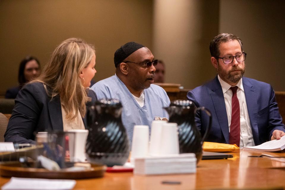 Artis Whitehead, who has been in jail since 2003 on charges related to the robbery of B.B. King’s in 2002, reacts as Jessica Van Dyke, the lead counsel and executive director of the Tennessee Innocence Project, and Jason Gichner, deputy director and senior legal counsel of the Tennessee Innocence Project, show him the ruling by Shelby County Criminal Court Judge Jennifer Fitzgerald that he would be released later in the day and given a new trial on Friday, December 15, 2023.