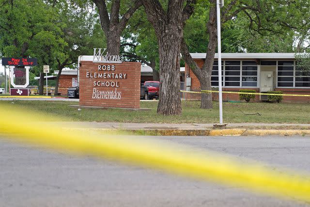 ALLISON DINNER/AFP via Getty Sheriff crime scene tape is seen outside of Robb Elementary School as State troopers guard the area in Uvalde, Texas, on May 24, 2022. - An 18-year-old gunman killed 19 children at an elementary school in Texas.