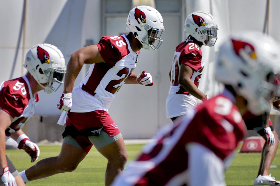 Arizona Cardinals' Zaven Collins (25) works out during an NFL football rookie minicamp, Friday, May 14, 2021, in Tempe, Ariz. (AP Photo/Matt York)