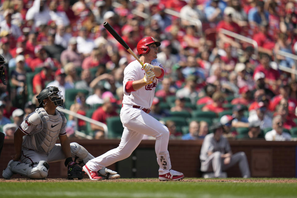 St. Louis Cardinals' Nolan Gorman watches his grand slam during the sixth inning of a baseball game against the Arizona Diamondbacks Wednesday, April 19, 2023, in St. Louis. (AP Photo/Jeff Roberson)