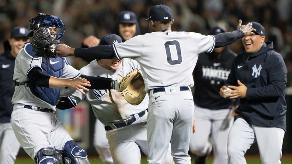 Jun 28, 2023; Oakland, California, USA; New York Yankees starting pitcher Domingo German (0) celebrates with teammates after pitching a perfect game against the Oakland Athletics at Oakland-Alameda County Coliseum. It was the first perfect game in MLB since 2012 and the fourth perfect game in franchise history.