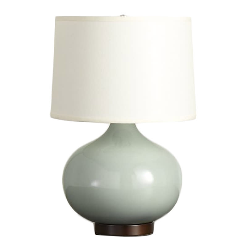 <a rel="nofollow noopener" href="http://rstyle.me/n/bvk3f9jduw" target="_blank" data-ylk="slk:Merie Blue Table Lamp with Bronze Base, Crate & Barrel, $199;elm:context_link;itc:0;sec:content-canvas" class="link ">Merie Blue Table Lamp with Bronze Base, Crate & Barrel, $199</a>