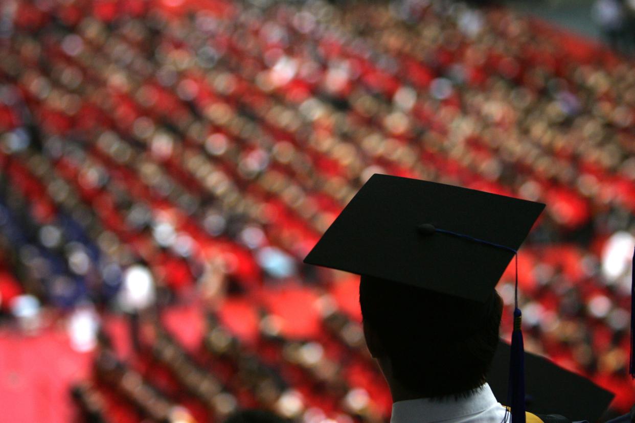 Students graduate at Tsinghua University in Beijing in July 2007. (Photo: China Photos/Getty Images)