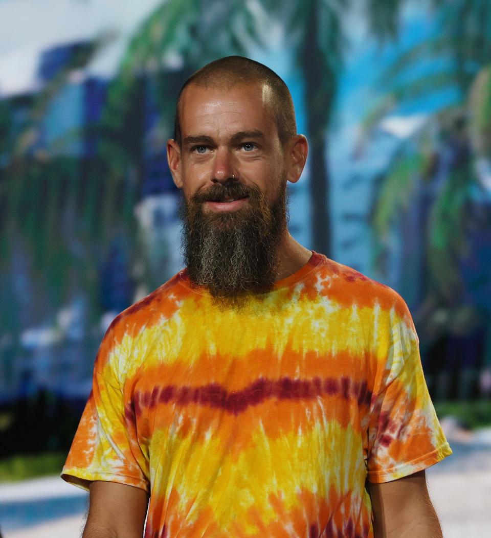 closeup of him in a tie-dye shirt