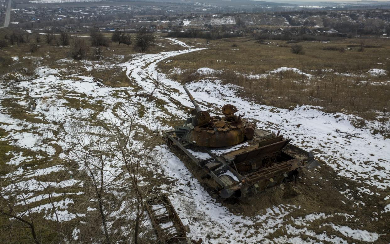 KAMYANKA, UKRAINE - FEBRUARY 11: A destroyed tank sits atop a hillside on February 11, 2023 in Kamyanka, Ukraine. Meanwhile Russia has launched a new winter offensive in the nearby Donbas region of eastern Ukraine. (Footage by John Moore/Getty Images) - John Moore/Getty Images
