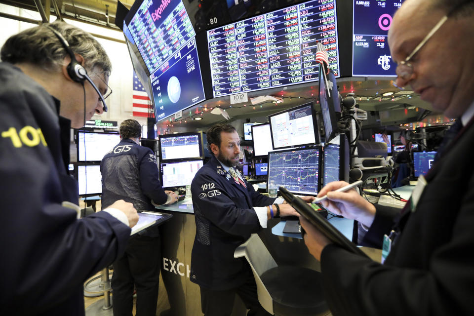 NEW YORK, Dec. 4, 2018 — Traders work at the New York Stock Exchange in New York, the United States, Dec. 3, 2018. U.S. stocks closed higher on Monday. The Dow Jones Industrial Average increased 287.97 points, or 1.13 percent, to 25,826.43. The S&P 500 increased 30.20 points, or 1.09 percent, to 2,790.37. The Nasdaq Composite Index was up 110.98 points, or 1.51 percent, to 7,441.51. (Xinhua/Wang Ying) (Xinhua/ via Getty Images)