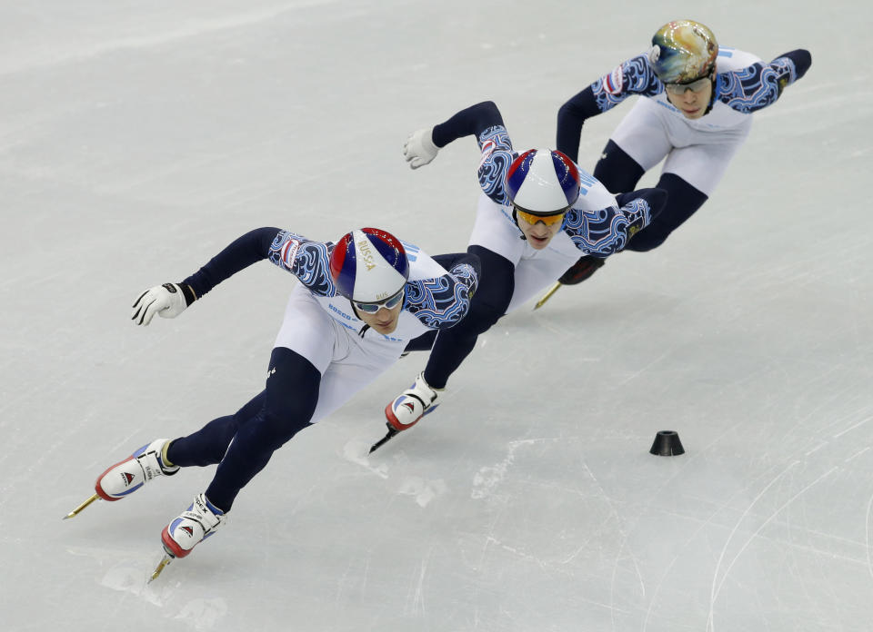 Vladimir Grigorev of Russia and his team members train during a short track speedskating practice session at the Iceberg Skating Palace ahead of the 2014 Winter Olympics, Thursday, Feb. 6, 2014, in Sochi, Russia. (AP Photo/Darron Cummings)