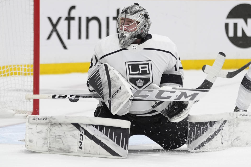 Los Angeles Kings goaltender David Rittich deflects a shot on goal during the second period of an NHL hockey game against the Nashville Predators, Wednesday, Jan. 31, 2024, in Nashville, Tenn. (AP Photo/George Walker IV)