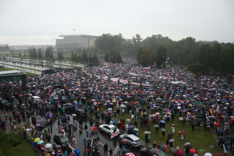 People attend an opposition rally to reject the presidential election results in Minsk