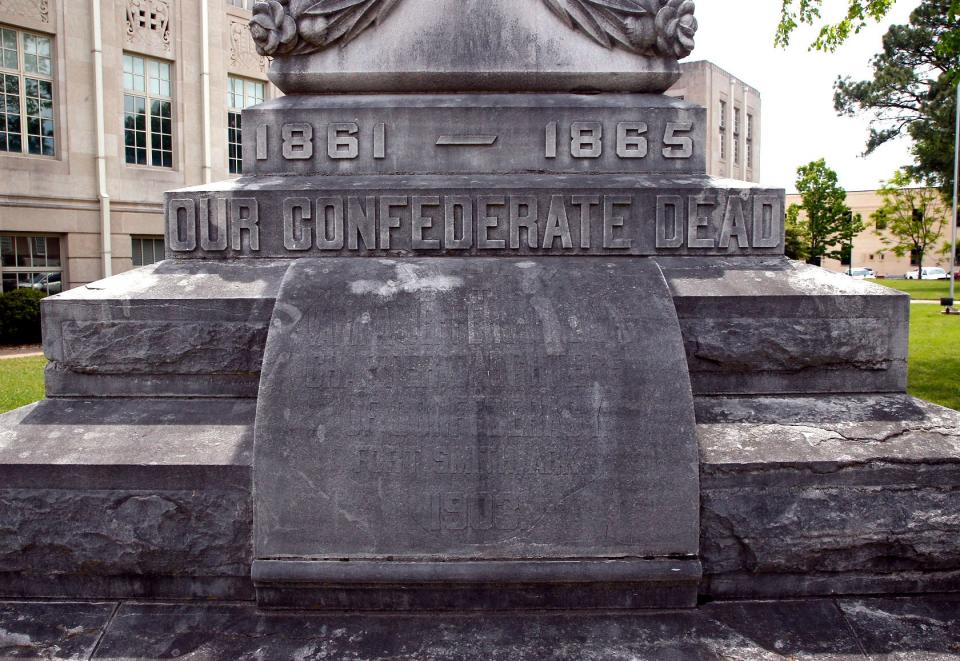 The Fort Smith Confederate Monument at the Sebastian County Courthouse on April 25, 2022. The inscription reads "Our Confederate Dead" erected by the Varina Jefferson Davis Chapter, Daughters of Confederacy Fort Smith, Ark. 1903."