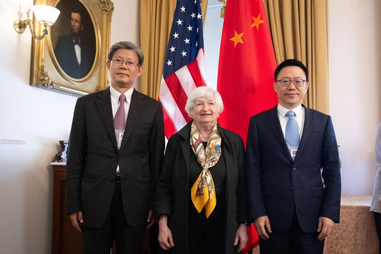 Treasury Secretary Janet Yellen (C), with Chinese Vice Minister of Finance Liao Min (R) and People's Bank of China Deputy Director Xuan Changneng, poses during the US-China Financial Working Group and the Economic Working Group, at the Treasury Department in Washington, DC on April 16, 2024.