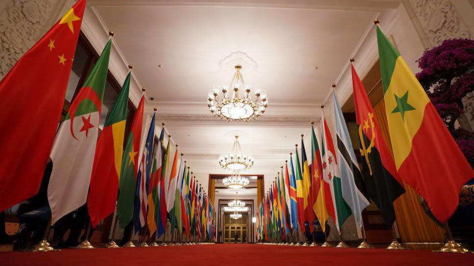 The flags of Africa and China lined up down a red carpet at the Great Hall of the People - Wednesday 4 September 2024